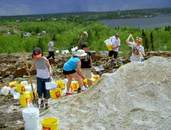 McIsaac School Students Help to Spread Limestone